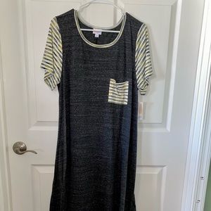 Brand new - Black (with white, blue, yellow stripped sleeves/pocket) XL Carly